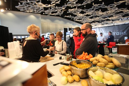 RUTH BONNEVILLE / WINNIPEG FREE PRESS

Fiona Larkin a promotor with Ocean Sales explains to people attending the show how to make homemade soup in 26 min with the Smart Living Soup Maker at the Winnipeg Home Renovation Show at RBC Convention Centre Saturday.  

Standup photo 
 Jan 14, 2017