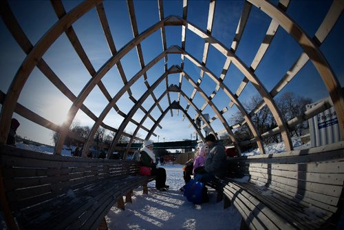 JOHN WOODS / WINNIPEG FREE PRESS
Snookie and BJ Tumlos, with their children Sam and Kiera, enjoy the great weather on The Forks river trail Sunday, January 15, 2017.