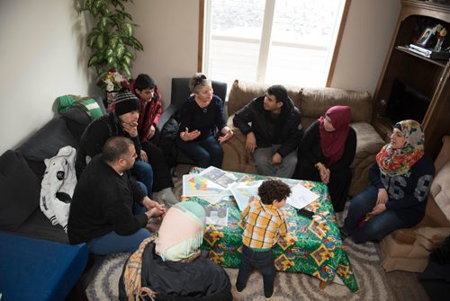 DAVID LIPNOWSKI / WINNIPEG FREE PRESS 

DAVID LIPNOWSKI / WINNIPEG FREE PRESS 

Val Schellenberg volunteers offering in-home English conversation classes to Syrian refugee families at the home of Fadel and Rania Ahmad January 17, 2017. The refugees from Syria arrived in Canada last February.
