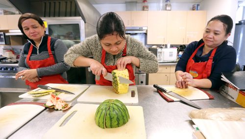 JASON HALSTEAD / WINNIPEG FREE PRESS

L-R: Participants Flocerfinda Zacarias, Anna Lou Jumawan and Agnes Sapitan learn proper chopping technique for fruits and vegetables as part of the six-week kitchen training program at Winnipeg Harvest on Jan. 11, 2017. (See Social Page)