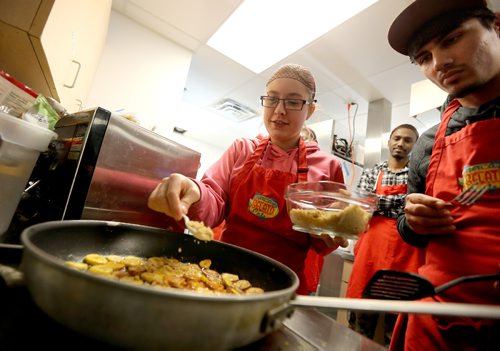 JASON HALSTEAD / WINNIPEG FREE PRESS

L-R: Riley Higgins and Shuhaib Toorialia cook plantain as part of the six-week kitchen training program at Winnipeg Harvest at Winnipeg Harvest on Jan. 11, 2017. (See Social Page)