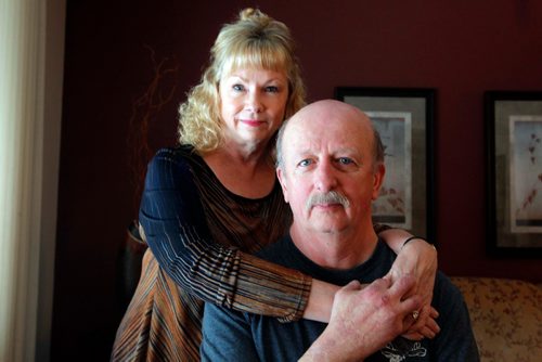 BORIS MINKEVICH / WINNIPEG FREE PRESS
Firefighter Ed Wiebe is an injured survivor of the 2007 fire that killed two firefighters. Here he poses for a photo with his wife Diane Wiebe, back left.  Photo taken at their home. NICK MARTIN STORY. JAN. 20, 2017