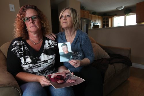 RUTH BONNEVILLE / WINNIPEG FREE PRESS

Colleen Hogue (left) and her older sister, Brenda Managh,  hold photos of their late brother, Robert McAdam, who died while in the Winnipeg Remand Centre.  The sisters spoke out about how he died, which happened after years of alcohol abuse, and explain it was not the fault of the Remand Centre

See story Randy Turner story.  
 Jan 20, 2017