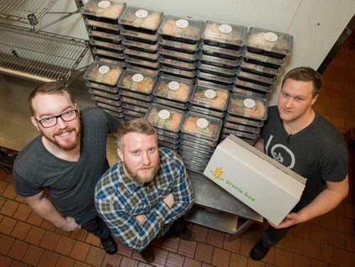 DAVID LIPNOWSKI / WINNIPEG FREE PRESS 

(Left to right) Prairie Box co-owners Lewis Glassey, Brandon Schofield and sous-chef Jon Rosnoski prepare this week's meals in the kitchen of Fionn MacCool's Sunday January 22, 2017. Prairie Box is Winnipeg's first subscription, restaurant-style meal delivery service.