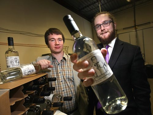 PHIL HOSSACK / WINNIPEG FREE PRESS -  Zach Isaacs (left) and his partner Willows Christopher are a couple of 20 year-olds who have started a home-made wine delivery company  selling high octane wine ($9.99) with home delivey. See Martin Cash story.  (the wine is clear because it's made without fruit (grapes) just a sugar solution and "special" yeast that p[roduces 20% alcohol content.)  ....January 23, 2017