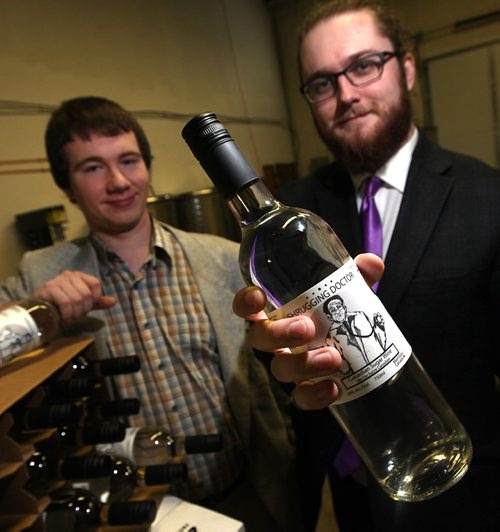 PHIL HOSSACK / WINNIPEG FREE PRESS -  Zach Isaacs (left) and his partner Willows Christopher are a couple of 20 year-olds who have started a home-made wine delivery company  selling high octane wine ($9.99) with home delivey. See Martin Cash story.  (the wine is clear because it's made without fruit (grapes) just a sugar solution and "special" yeast that p[roduces 20% alcohol content.)  ....January 23, 2017