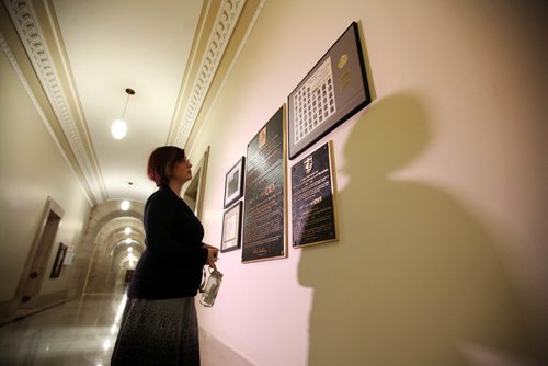 RUTH BONNEVILLE / WINNIPEG FREE PRESS


Vanessa Gregg who facilitates tours of the Legislative building reads the newly mounted display Tuesday called,-  Vote 100 wall,  at the Legislative Building which commemorates some women being given the right to vote in Canada 100 years ago.   
Standup photo 
 Jan 24, 2017
