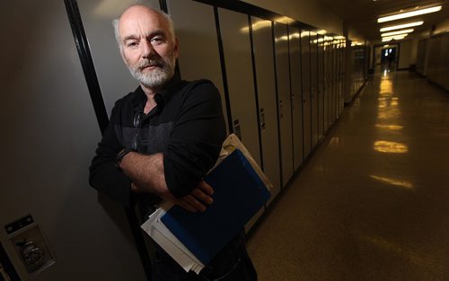 PHIL HOSSACK / WINNIPEG FREE PRESS -  Cam Brown, a Sprague school teacher poses with his medical expence files at work Tuesday. See Randy Turner's story. .  ....January 24, 2017