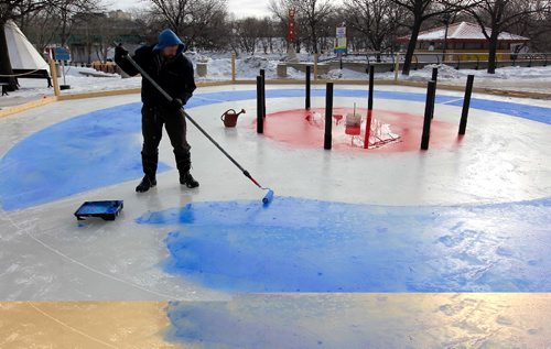 BORIS MINKEVICH / WINNIPEG FREE PRESS
Visual artist James Culleton was brought in to paint the lines on this 16 meter ice installation called "Crokicurl" at The Forks. JAN. 25, 2017