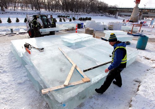 BORIS MINKEVICH / WINNIPEG FREE PRESS
Norwegian architect Luca Roncoroni, bottom right, goes over the construction of Warming Hut  "Stackhouse" at The Forks. It is the invited submission from world-renowned sculptor Anish Kapoor, famous for such art pieces as Cloud Gate in Chicago's Millenium Park. JAN. 25, 2017