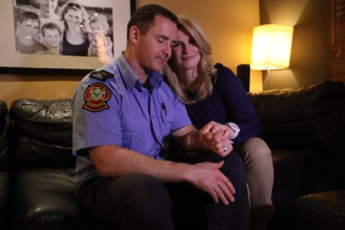 RUTH BONNEVILLE / WINNIPEG FREE PRESS


49.8 Feature: Firefighter Lionel Crowther at #11 fire station on Portage and with his family at their home in North Kildonan.  
See Story by Nick Martin on 10th anniversary of fire at 15 Place Gabrielle Roy in old St. Boniface that took the lives of two veteran firefighters, Thomas Nichols and Harold Lessard.  
Photo of Lionel Crowther and his wife Joanna, at home.  
 Jan 25, 2017