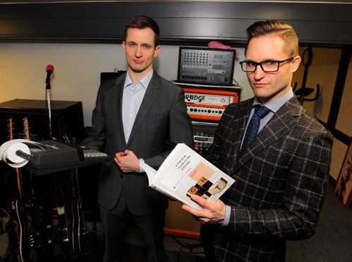 BORIS MINKEVICH / WINNIPEG FREE PRESS
MKM Management Services is a company run by Shane Matthewson, left, and Jesse Matthewson, right, of the noise-rock/hardcore band KEN mode. They pose for a photo in their home office in St. Vital. Erin Lebar story. JAN. 26, 2017