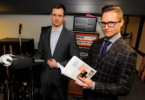 BORIS MINKEVICH / WINNIPEG FREE PRESS
MKM Management Services is a company run by Shane Matthewson, left, and Jesse Matthewson, right, of the noise-rock/hardcore band KEN mode. They pose for a photo in their home office in St. Vital. Erin Lebar story. JAN. 26, 2017