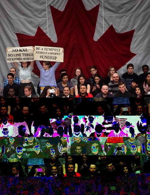 PHIL HOSSACK / WINNIPEG FREE PRESS -  Prime Minister Justin Trudeau debates hecklers in the Town Hall crowd Thursday as banners in the people seated behind him unfurl. See story.  ....January 26, 2017