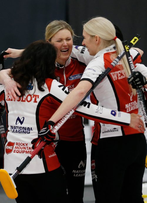 JOHN WOODS / WINNIPEG FREE PRESS
From left Michelle Englot, Leslie Wilson, Kate Cameron and Raunora Wescott celebrate after defeating Darcy Robertson in the finals of the Scotties at Eric Coy Arena in Winnipeg Sunday, January 29, 2017.
