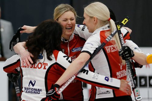 JOHN WOODS / WINNIPEG FREE PRESS
From left Michelle Englot, Leslie Wilson, Kate Cameron and Raunora Wescott celebrate after defeating Darcy Robertson in the finals of the Scotties at Eric Coy Arena in Winnipeg Sunday, January 29, 2017.
