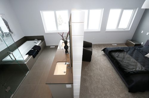 WAYNE GLOWACKI / WINNIPEG FREE PRESS

Homes. The master bedroom and bathroom at 34 Dovetail Crescent in Oak Bluff West. The  Artista Homes sales rep. is Jennifer Gulay.   Todd Lewys story   Jan.30  2017