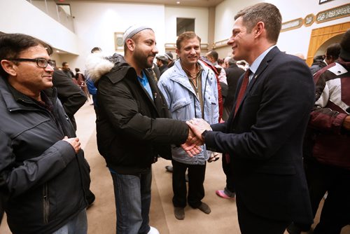 JOHN WOODS / WINNIPEG FREE PRESS
Mayor Brian Bowman meets community members as about 400 people gathered for a special prayer service for victims of the Quebec mosque shooting at the Waverley Grand Mosque Monday, January 30, 2017.