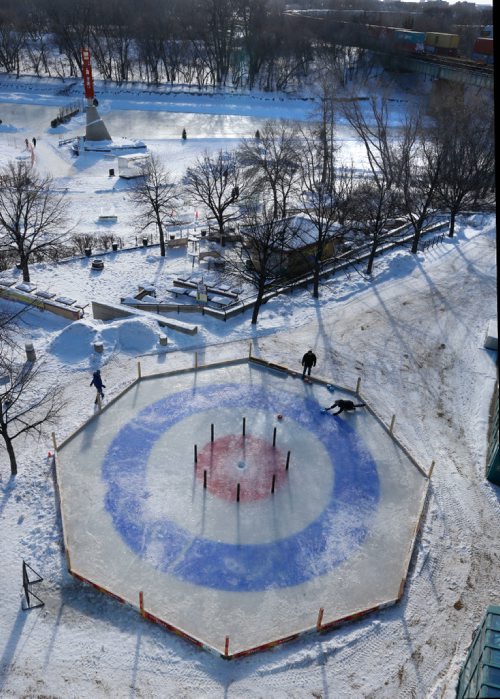 WAYNE GLOWACKI / WINNIPEG FREE PRESS 

49.8 Two fellows throwing rocks on the Crokicurl at The Forks.  Feb.1  2017