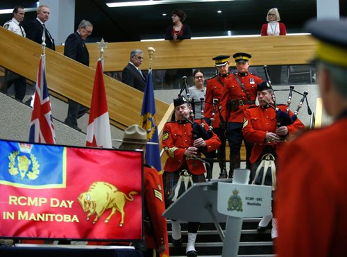 WAYNE GLOWACKI / WINNIPEG FREE PRESS 

In centre, Justice Minister Heather Stefanson and dignitaries are piped into the atrium in the RCMP D Division Headquarters Wednesday, she  announced  Feb.1 will be the first annual Royal Canadian Mounted Police Day in Manitoba  to recognize the many contributions of RCMP officers. To honour the RCMP, the minister invited young people throughout the province to draw, design or create a card and mail it to the province by May 31.¤ The cards will be displayed at the Legislative Building and then formally presented to the RCMP later this year.¤see mb. govt release Feb.1  2017