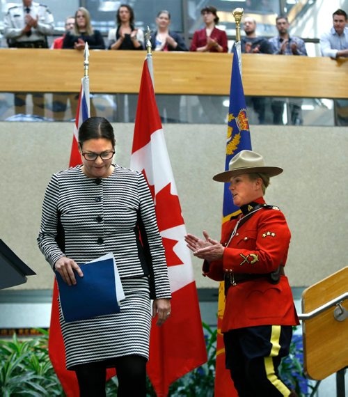 WAYNE GLOWACKI / WINNIPEG FREE PRESS 

Justice Minister Heather Stefanson at a ceremony with Sgt. Gil Bérubé in the atrium at the RCMP D Division Headquarters Wednesday announced Feb.1 will be the first annual Royal Canadian Mounted Police Day in Manitoba to recognize the many contributions of RCMP officers. To honour the RCMP, the minister invited young people throughout the province to draw, design or create a card and mail it to the province by May 31. The cards will be displayed at the Legislative Building and then formally presented to the RCMP later this year.see mb. govt release Feb.1  2017