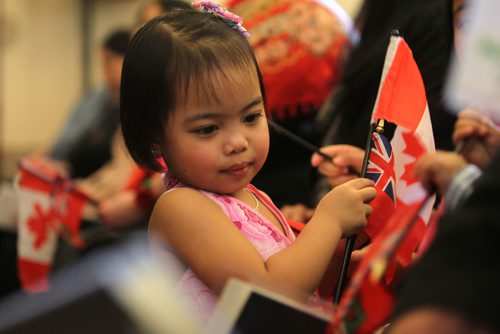 RUTH BONNEVILLE / WINNIPEG FREE PRESS

Audray Magnayi (4yrs) waves her Canadian and Manitoban flags after becoming a Canadian citizen with her family  at Citizenship Ceremony at the Legislative Building Wednesday afternoon.  

Feb 01, 2017
