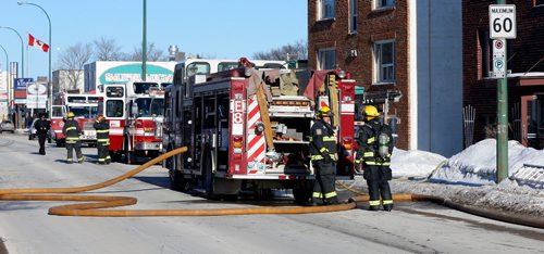 WAYNE GLOWACKI / WINNIPEG FREE PRESS 

Winnipeg Fire Fighters and Police attended a fire in a third floor suite in the Kimberley apartment building at 765 Henderson Hwy. Thursday afternoon. The female occupant of the suite suffered smoke inhalation and the cause of the fire is under investigation. The suite sustained smoke and fire damage.  Feb. 2   2017