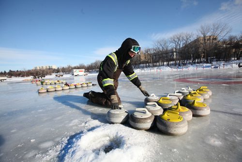RUTH BONNEVILLE / WINNIPEG FREE PRESS

Jonathan Froese with The Forks RIver Trail crew lines up the curling rocks on the rink on the Red River near the Forks for the upcoming curling Bonspiel this weekend.
Stand-up of finishing the set up for games.  


Feb 03,, 2017
