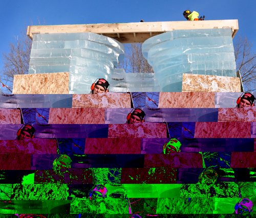 WAYNE GLOWACKI / WINNIPEG FREE PRESS 

Italian architect Luca Roncoroni at right and Winnipeg architect Peter Hargraves carry a block of ice Friday that will be placed on top of the Warming Hut called  Stackhouse by Anish Kapoor of London, England. This invited submission is being built at The Forks near the Assiniboine River, the five-metre-square ice hut will have an entrance that resembles a space portal.   Feb. 3  2017