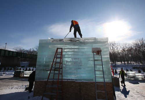 RUTH BONNEVILLE / WINNIPEG FREE PRESS

Finishing touches are done to the Stackhouse warming hut made out of sheets of ice Friday afternoon by Anish Kapoor Studio on the banks of the Assiniboine River which is part of the warming huts architecture competition at the Forks.
Standup 
Feb 03,, 2017
