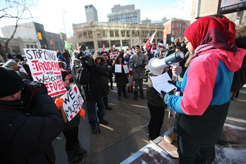 RUTH BONNEVILLE / WINNIPEG FREE PRESS

Protestors hold signs  at ralliy at 201 Portage  to call on Mayor Brian Bowman to make Winnipeg a sanctuary city for undocumented migrants Friday. 

Feb 03,, 2017
