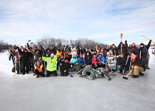 RUTH BONNEVILLE / WINNIPEG FREE PRESS

Players participating in the 3:30pm games for  the 16th Ironman Curling Bonspiel on the Red River at the Forks ham it up for a group photo Saturday.
Feb 04,, 2017
