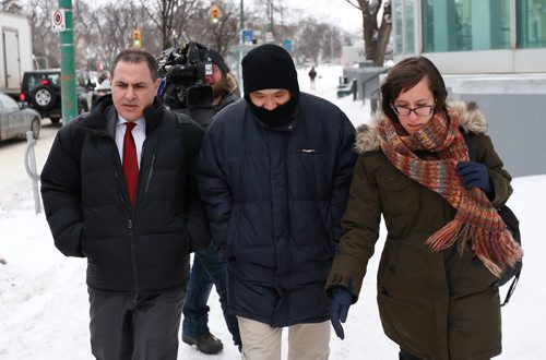 WAYNE GLOWACKI / WINNIPEG FREE PRESS 

In centre, Will Baker, formerly known as Vince Li leaves after his meeting at the Criminal Code Review Board hearing Monday. He was diagnosed with schizophrenia and found not criminally responsible for the killing of Tim McLean, 22, in 2008. Mike McIntyre story.  Feb. 3  2017