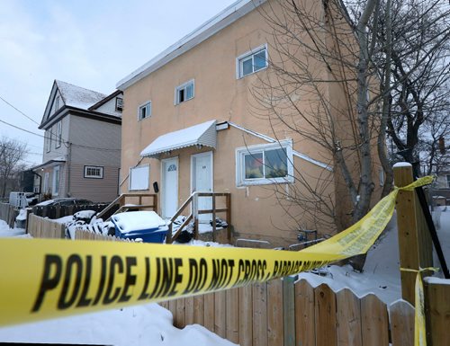 WAYNE GLOWACKI / WINNIPEG FREE PRESS 

Winnipeg Police at the scene of a possible homicide  in the 500 block of Magnus St. Tuesday morning.  Feb. 7  2017