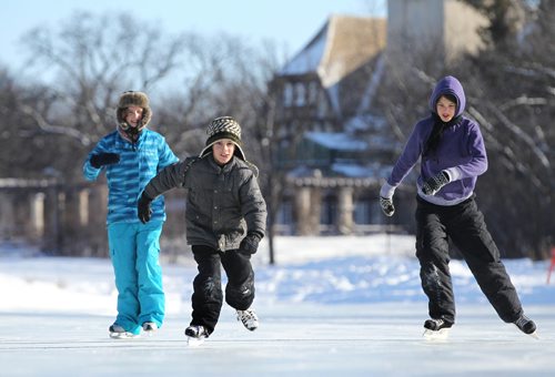 RUTH BONNEVILLE / WINNIPEG FREE PRESS

Siblings from left - Sophie Arnaud (13yrs), Cedric (8yrs) and Alice (11yrs) enjoy the afternoon sun as they skate on the Duck Pond at Assiniboine Park Tuesday.  The Arnaud family are from New Brunswick and are living in Winnipeg temporarily for their dads work.  Being home schooled they get their school work done in the morning allowing time for outdoor activities in the afternoons.
Standup photo.
  Feb 07,, 2017
