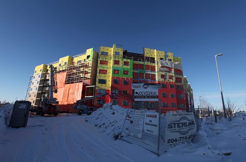 PHIL HOSSACK / WINNIPEG FREE PRESS  -  Residential development rises on the NW corner of Kenaston and Sterling Lyon Tuesday in the "Season's' residential, office, commercial development. Murray McNeil's story.   - February 7, 2017