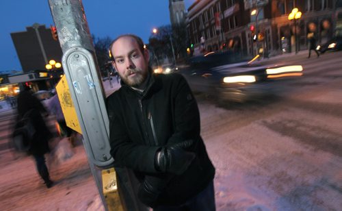 PHIL HOSSACK / WINNIPEG FREE PRESS  -  Robert Keizer is a young, adult resident of Osborne Village, and chose the area for its walkability.  He poses at osborne and River in the "Village" neighborhood he calls home. Kelly Taylor story. - February 7, 2017