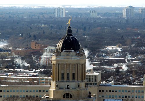 BORIS MINKEVICH / WINNIPEG FREE PRESS
Photos of the city taken from the Prairie 360 restaurant, formerly known as Revolving Restaurant (Fort Garry Place/Garry Street). The Golden Boy on the top of the The Manitoba Legislative Building. Feb. 8, 2017