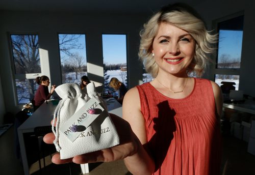 WAYNE GLOWACKI / WINNIPEG FREE PRESS 

A local jewelry designer and owner Amanda Park  has her earrings in the official Grammy swag bag that all the celebs will get this weekend at the awards show. She is holding earrings similar to the ones in swag bag. The company is called Park and Buzz. Erin Lebar story    Feb. 9  2017