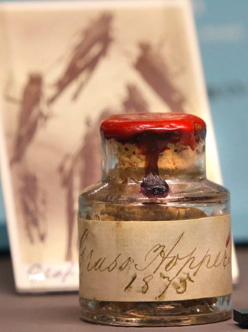 WAYNE GLOWACKI / WINNIPEG FREE PRESS 

An ink bottle containing rare Manitoba specimens of the Rocky Mountain Locust that devastated crops throughout the 1800s. This is in the Legacies of Confederation: A New Look At Manitoba History exhibit at the Manitoba Museum. Bill Redekop story    Feb. 9  2017
