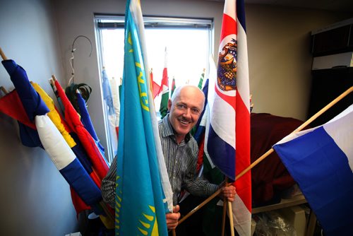RUTH BONNEVILLE / WINNIPEG FREE PRESS

SATURDAY SPEICAL: STEINBACH GROWTH
Richard Harder, program director of the Eastman Immigration Services in Steinbach talks about the population explosion and the multi-cultural element with reporter.  
Harder with flags from hundreds of countries now being represented in their growing city and showcased with flags representing their home country during Steinbach's annual culture days.  

  Feb 07,, 2017
