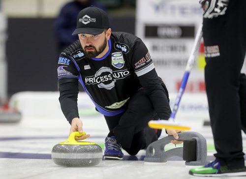 TREVOR HAGAN / WINNIPEG FREE PRESS
Reid Carruthers throws a rock while playing against Mike McEwen at the Viterra Championship in Portage la Prairie, Saturday, February 11, 2017. The winner would move directly the Sundays final.