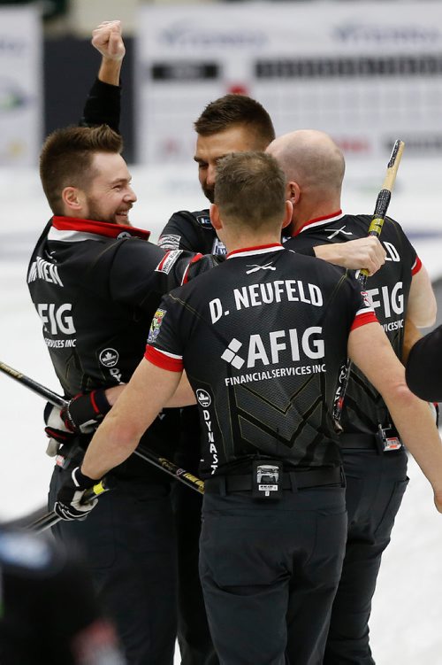JOHN WOODS / WINNIPEG FREE PRESS
Mike McEwan and his team celebrate defeating the Reid Carruthers team in the Manitoba Men's Curling Championships in Portage La Prairie Sunday, February 12, 2017.

