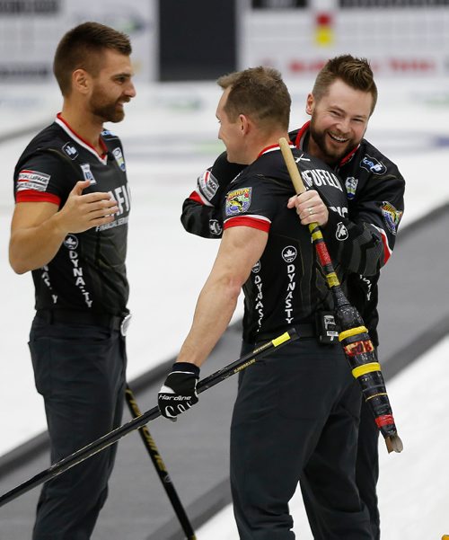 JOHN WOODS / WINNIPEG FREE PRESS
Mike McEwan and his team celebrate defeating the Reid Carruthers team in the Manitoba Men's Curling Championships in Portage La Prairie Sunday, February 12, 2017.
