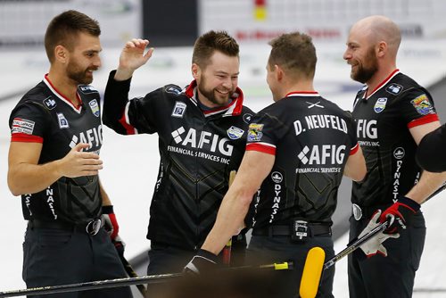 JOHN WOODS / WINNIPEG FREE PRESS
Mike McEwan and his team defeats the Reid Carruthers team in the Manitoba Men's Curling Championships in Portage La Prairie Sunday, February 12, 2017.

