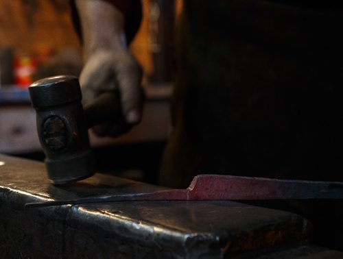 MIKE DEAL / WINNIPEG FREE PRESS
Blacksmith Matt Jenkins owner of Cloverdale Forge.
Shaping heated metal.
170131 - Tuesday, January 31, 2017.