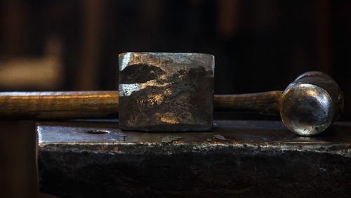 MIKE DEAL / WINNIPEG FREE PRESS
Blacksmith Matt Jenkins owner of Cloverdale Forge.
A hammer and anvil fitted with a cutting blade.
170131 - Tuesday, January 31, 2017.
