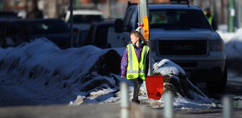 PHIL HOSSACK / WINNIPEG FREE PRESS  -   A student crossing guard mans her post at Ellice and Agnes Monday afternoon. See story.  - February 13, 2017