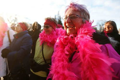 JOHN WOODS / WINNIPEG FREE PRESS
Shirley Stone cheers as the Manitoba Legislature was lit up in pink at a celebration of the 20th anniversary of the Chemo Savvy Breast Cancer Dragon Boat team, Monday, February 13, 2017.