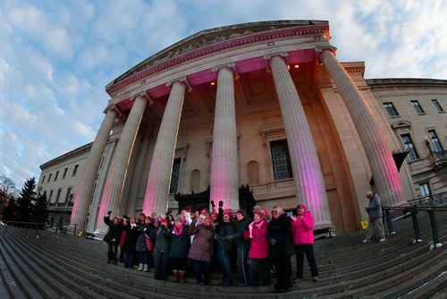 JOHN WOODS / WINNIPEG FREE PRESS
Members of the Chemo Savvy dragon boat team pose for a picture as the Manitoba Legislature was lit up in pink at a celebration of the 20th anniversary of the Chemo Savvy Breast Cancer Dragon Boat team, Monday, February 13, 2017.